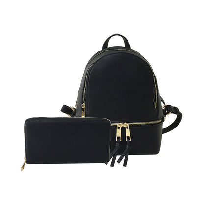 A small black synthetic leather backpack with gold-tone hardware, accompanied by a matching wallet.